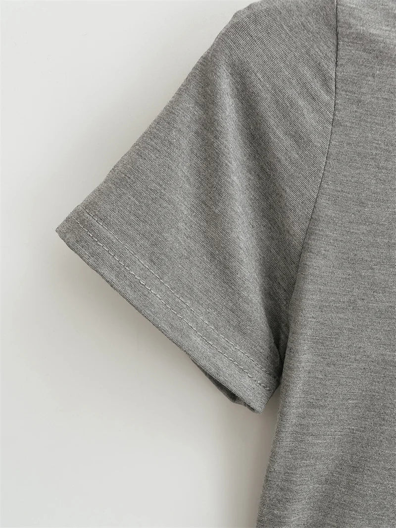 SlimMuse Tee – Y2K Solid Fit Top  Simple style. Sculpted fit. Everyday confidence.