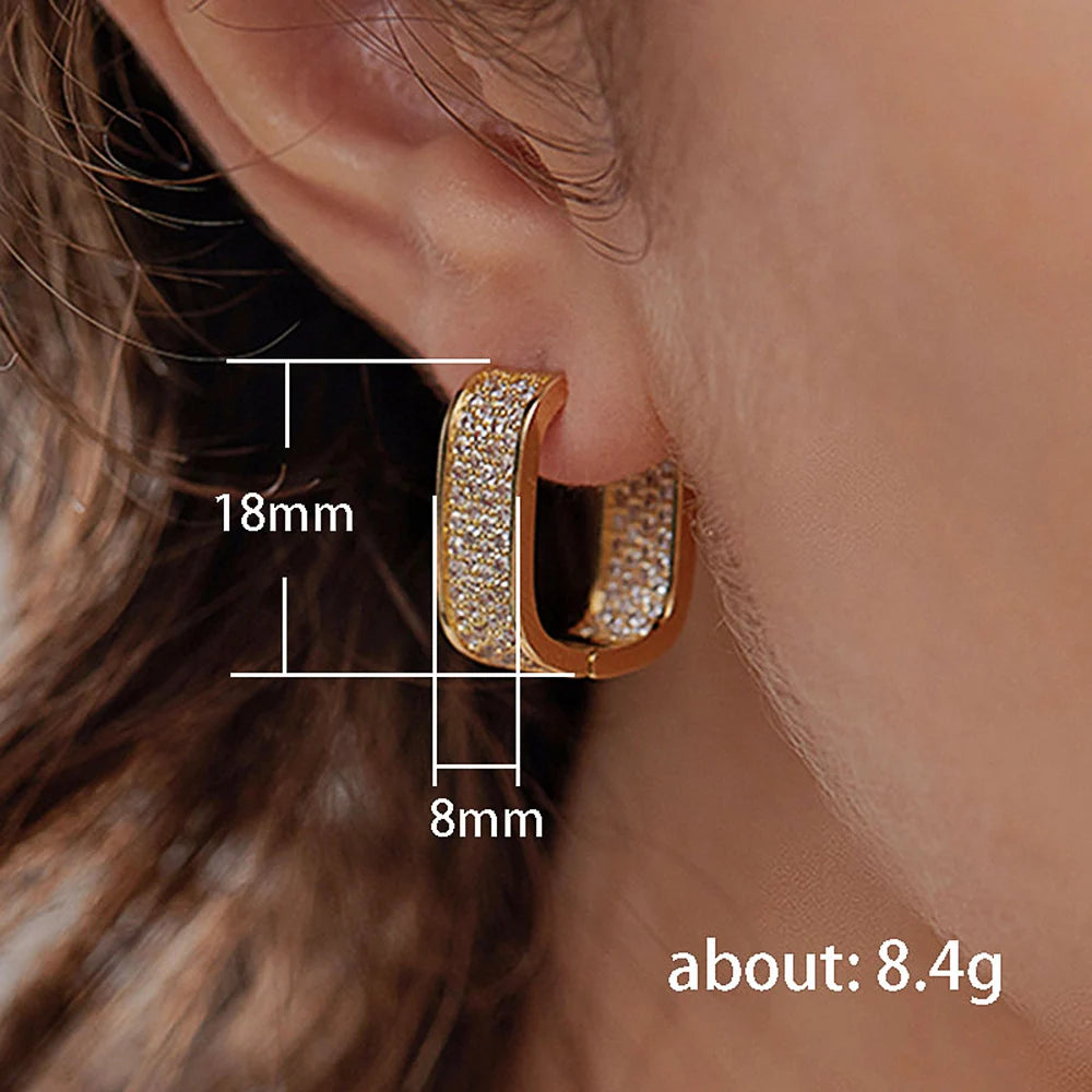 Bling Aura Hoops – CZ Luxury Statement Earrings  Maximum shine. Minimal effort. Pure elegance.