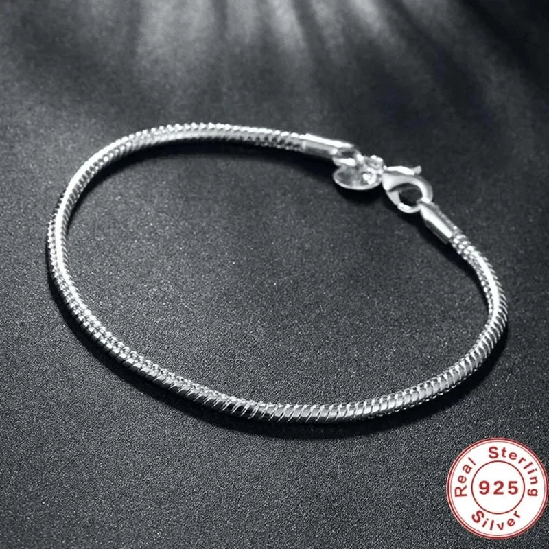 Silver Serpent Charm Bracelet – 925 Sterling Silver  Pure silver. Smooth feel. Timeless elegance.