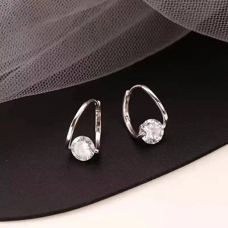 Crystal Heart Hoops – 925 Silver Needle Earrings  Soft sparkle. Sweet charm. Everyday luxury.