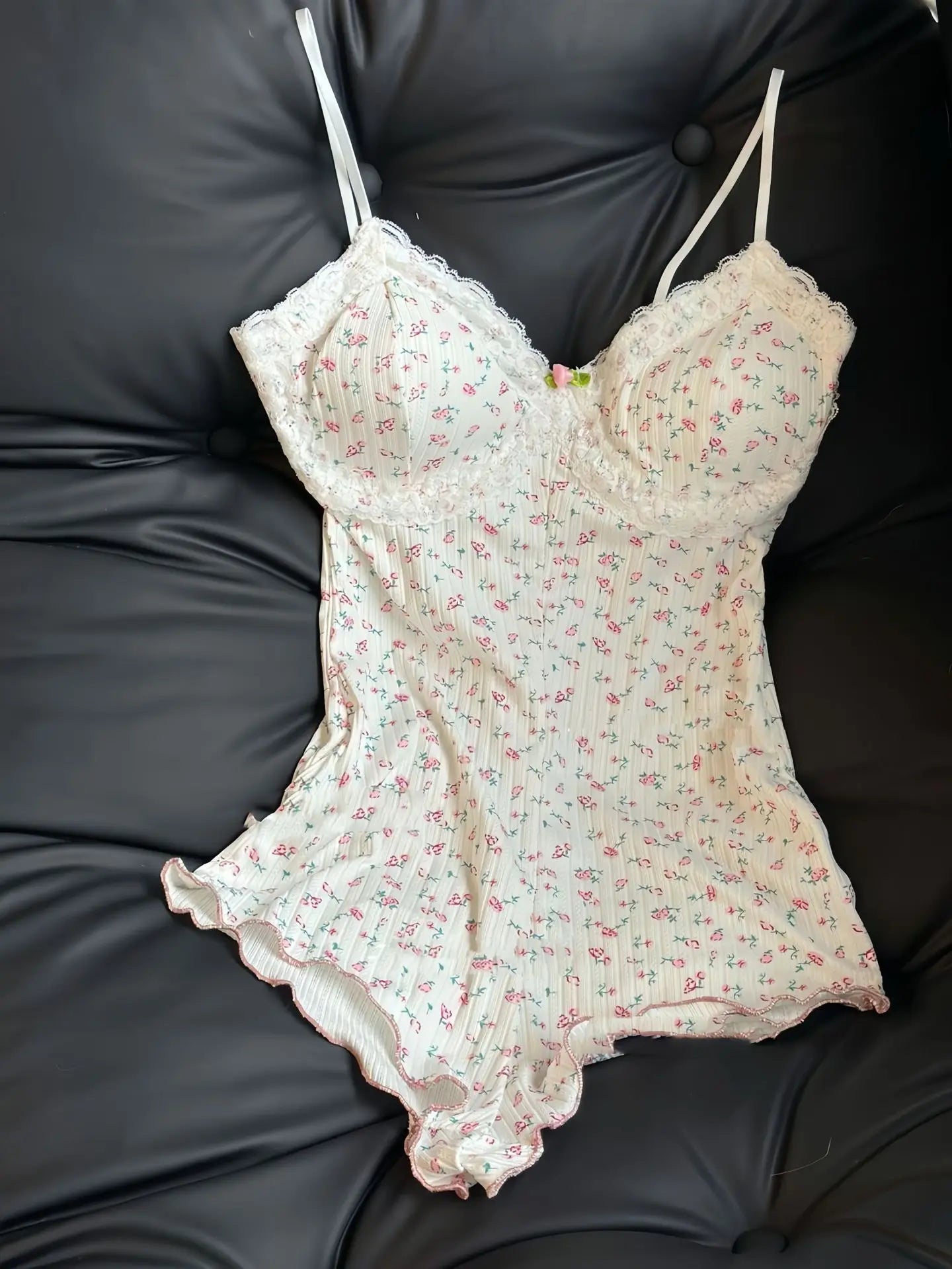 FloraLace Bodysuit – Floral Print Sleeveless Fit  Soft lace. Floral charm. Effortless allure.