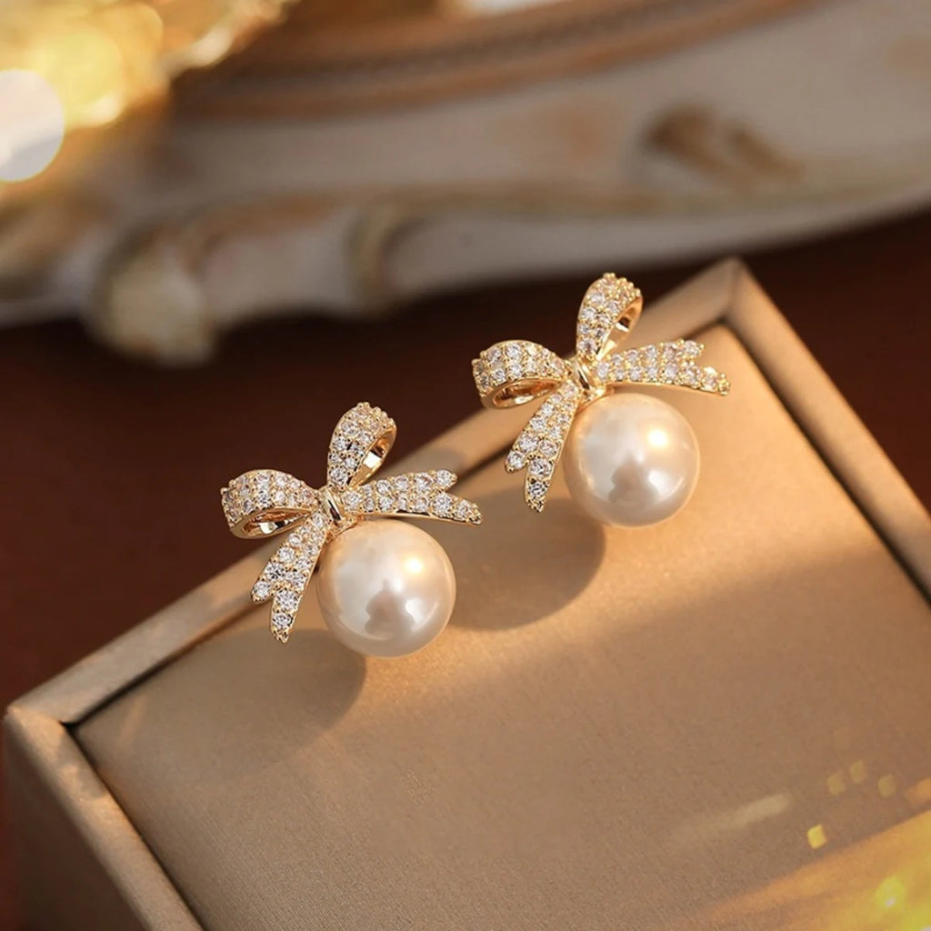 Love Pearl Earrings – Minimalist Heart Elegance  Simple love. Soft shine. Timeless beauty.