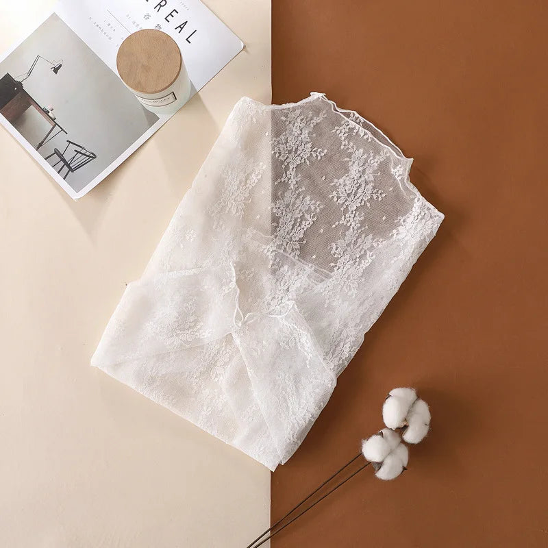 LaceMesh Crop Top – Sheer Long Sleeve Elegance  Delicate lace. Bold layers. Effortless style.