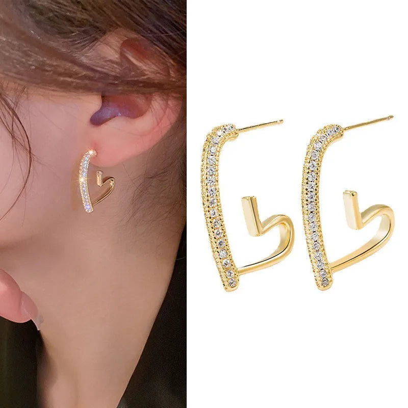 Crystal Heart Hoops – 925 Silver Needle Earrings  Soft sparkle. Sweet charm. Everyday luxury.
