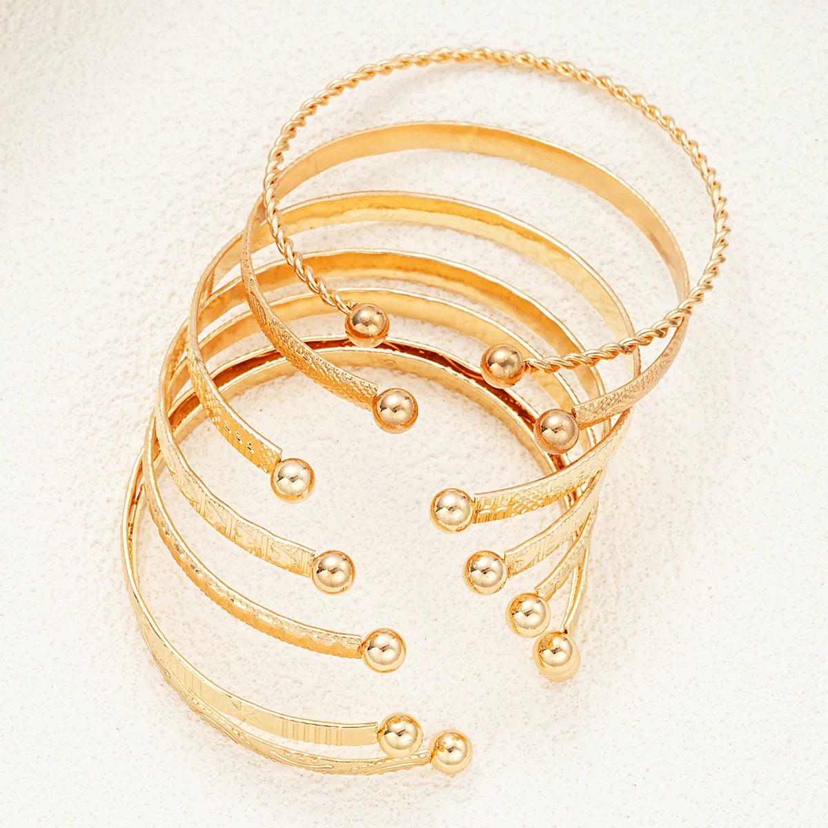 Gold Edge Bracelet Set – 7PCS Punk Heart Bangles  Bold gold. Street attitude. Stack your style.