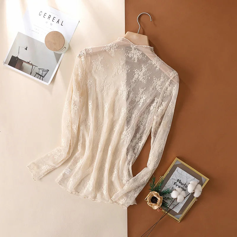 LaceMesh Crop Top – Sheer Long Sleeve Elegance  Delicate lace. Bold layers. Effortless style.