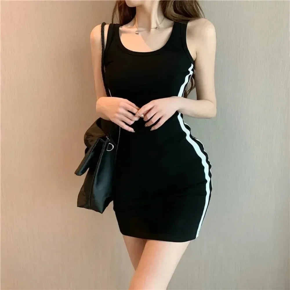 SleekMuse Sheath Dress – Spaghetti Strap Slim Fit  Simple lines. Perfect fit. Effortless confidence.