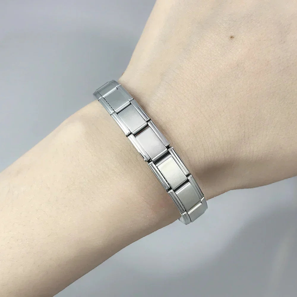 CharmLink Bracelet – 9mm Italian Stainless Steel Chain  Build your story. Wear your style. Personalize your look.