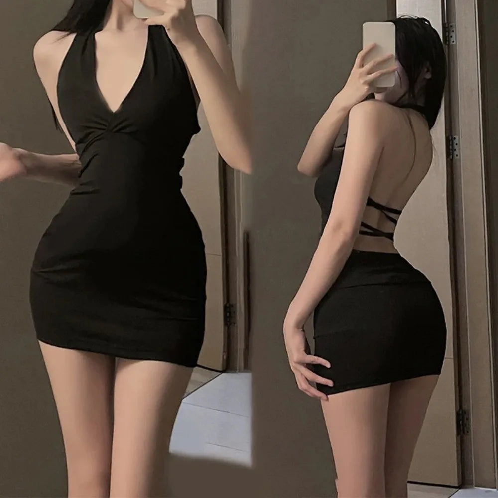 MidnightWrap Mini Dress – Halter Backless V-Neck  Sleek black. Bold back. Pure confidence.