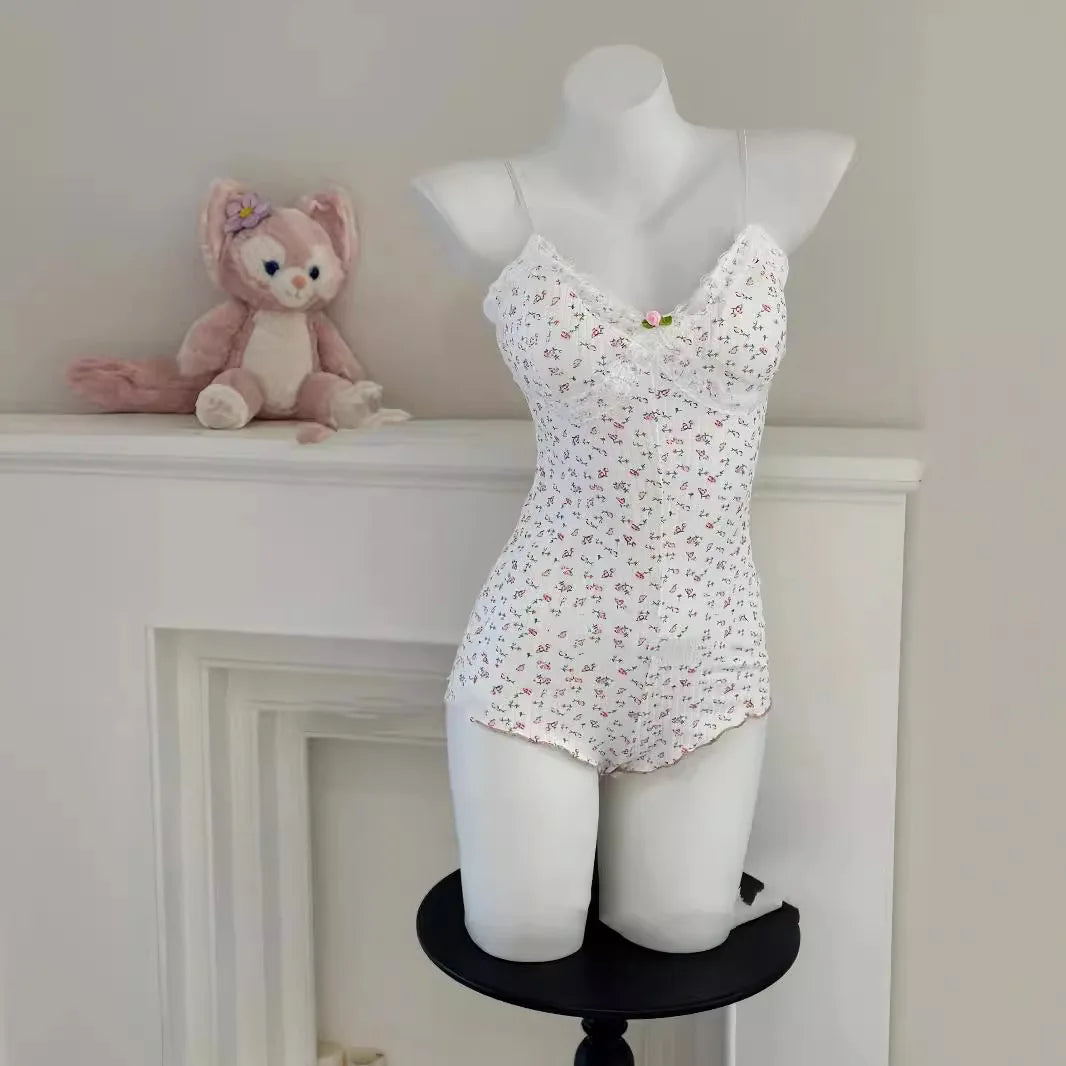 FloraLace Bodysuit – Floral Print Sleeveless Fit  Soft lace. Floral charm. Effortless allure.