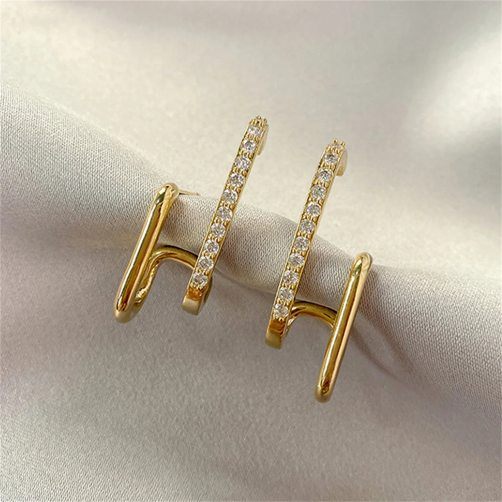 U-Luxe Crystal Earrings – Irregular Gold Statement  Modern shape. Crystal shine. Effortless luxury.