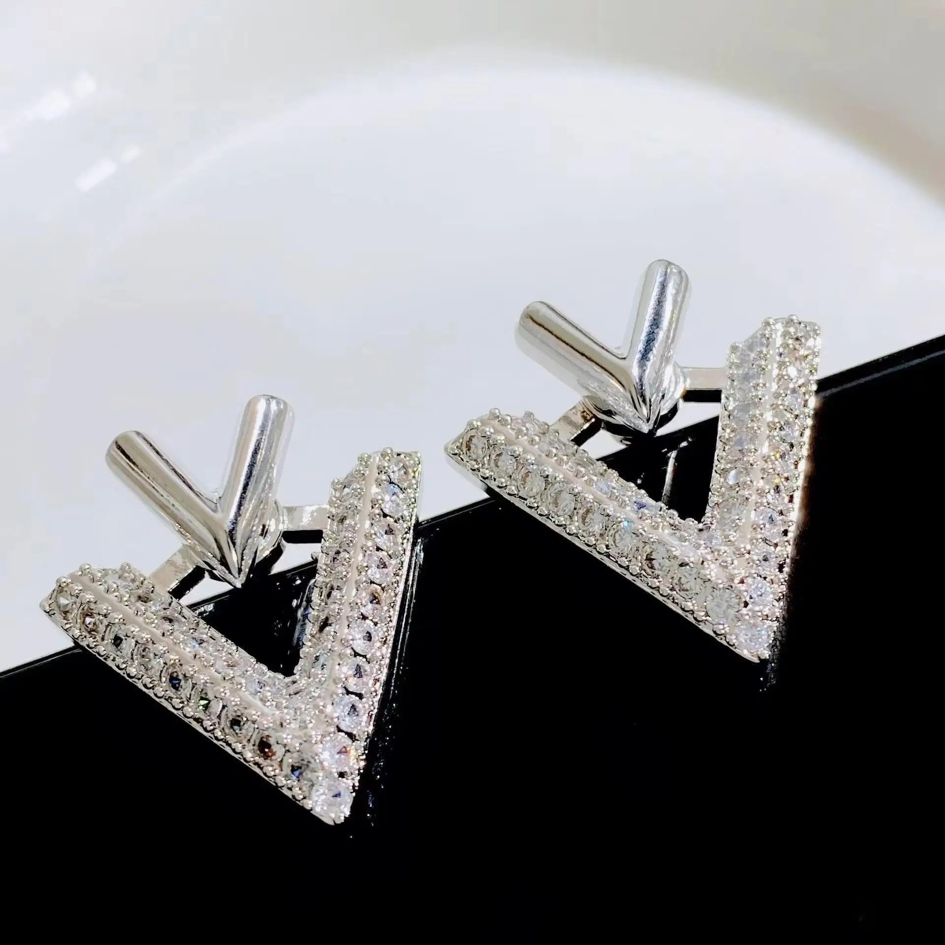 Crystal Heart Hoops – 925 Silver Needle Earrings  Soft sparkle. Sweet charm. Everyday luxury.