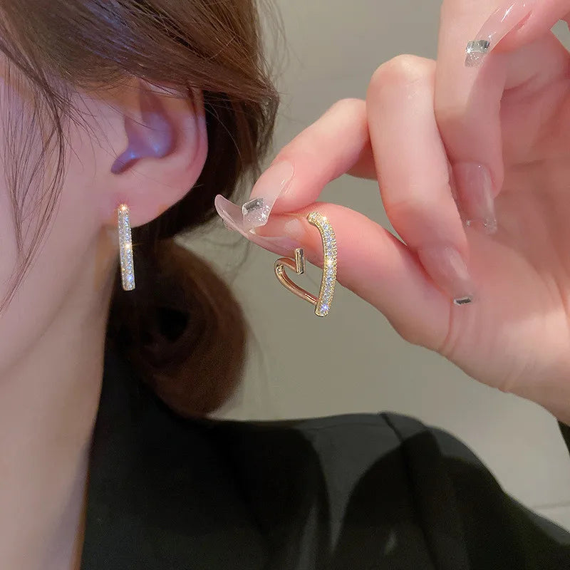 Crystal Heart Hoops – 925 Silver Needle Earrings  Soft sparkle. Sweet charm. Everyday luxury.