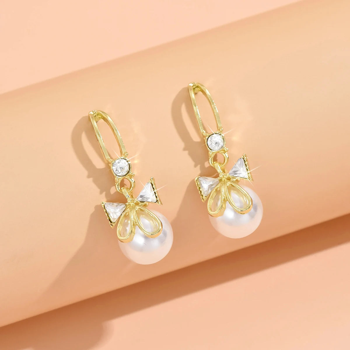 Love Pearl Earrings – Minimalist Heart Elegance  Simple love. Soft shine. Timeless beauty.