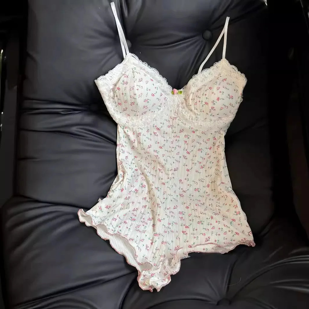 FloraLace Bodysuit – Floral Print Sleeveless Fit  Soft lace. Floral charm. Effortless allure.