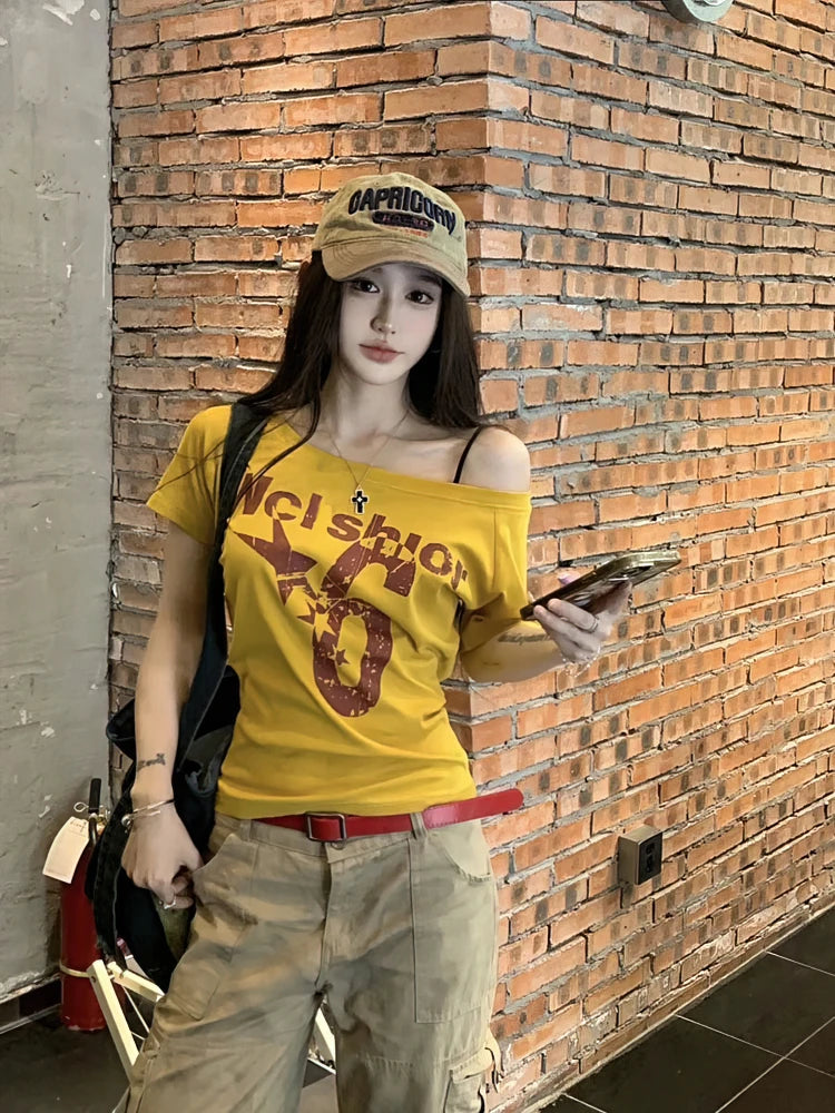 SportMuse Off-Shoulder Tee – Y2K Vintage Crop Top  Sporty edge. Vintage vibe. Effortless confidence.