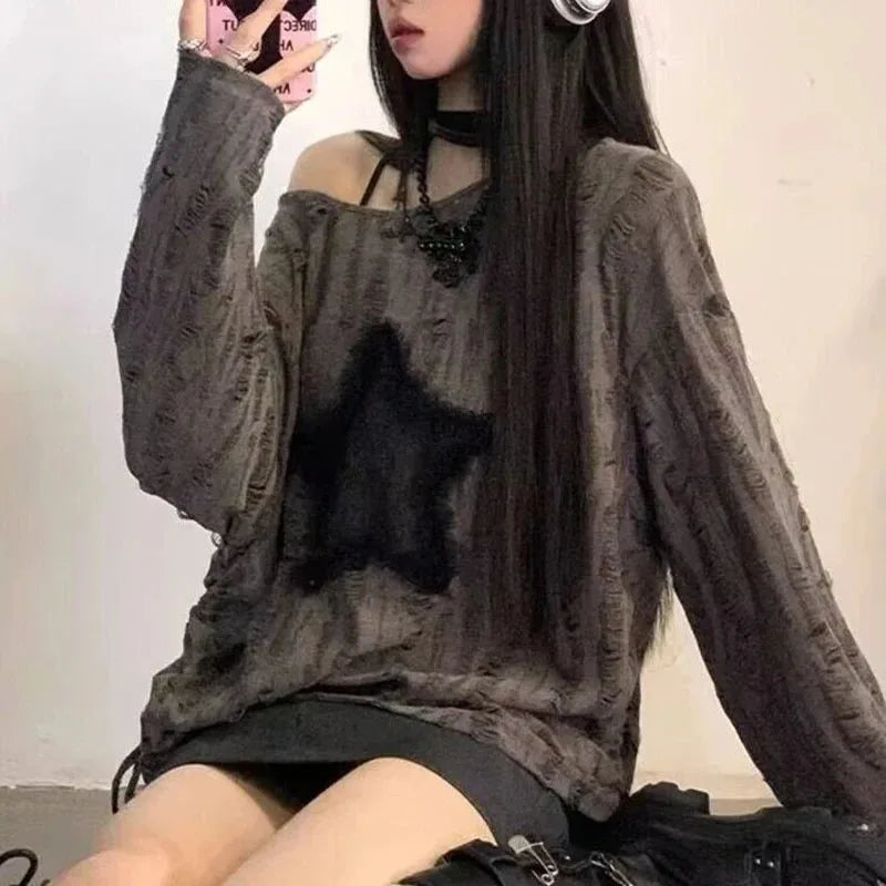 StarEdge Oversized Tee – Y2K Hole Print Streetwear  Bold details. K-pop vibes. Effortless attitude.