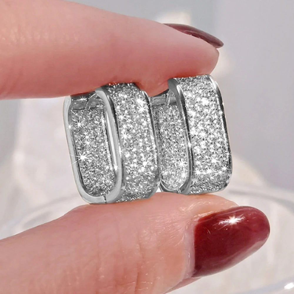 Bling Aura Hoops – CZ Luxury Statement Earrings  Maximum shine. Minimal effort. Pure elegance.
