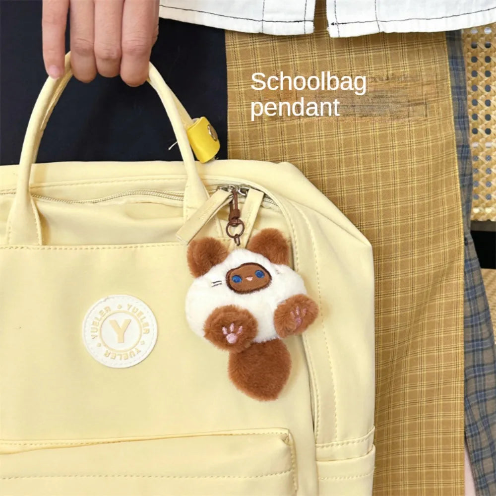 Purr Charm Plush – Cute Cat Doll Keychain  Soft, adorable, and full of personality.