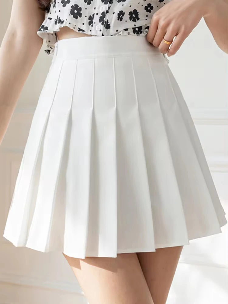 ClassyPleat Mini Skirt – High-Waist JK A-Line Style  Playful pleats. Flattering fit. Timeless vibe.