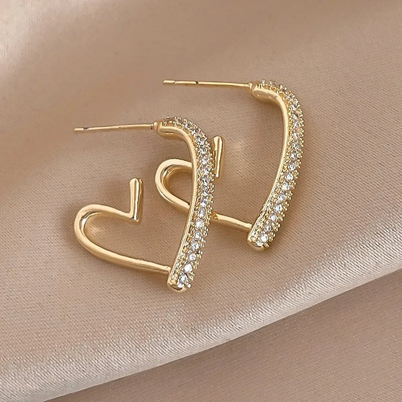 Crystal Heart Hoops – 925 Silver Needle Earrings  Soft sparkle. Sweet charm. Everyday luxury.