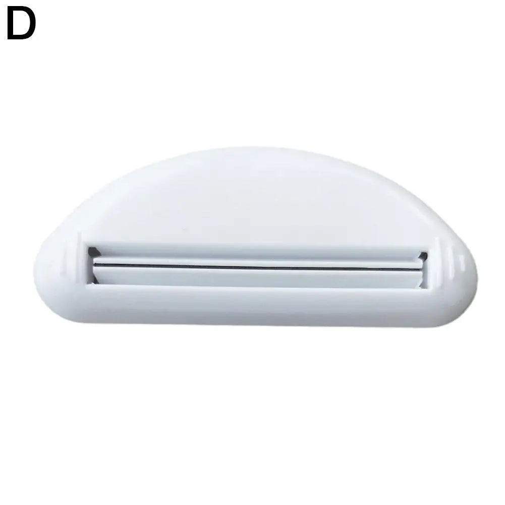 SqueezePro Tube Dispenser – Multi-Use Toothpaste Squeezer  No waste. No mess. Maximum efficiency.