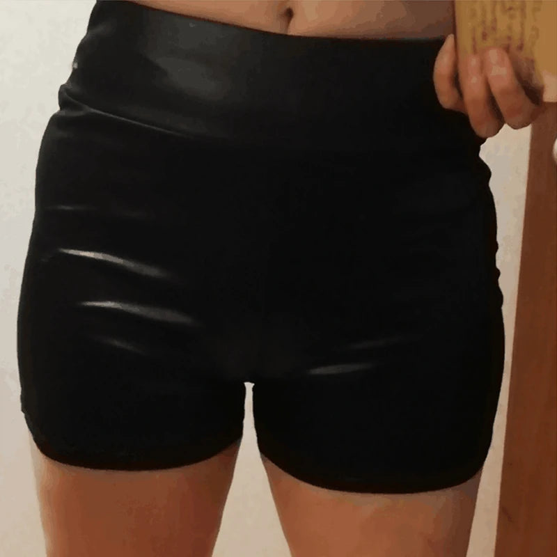 NoirShine Mini Shorts – High-Waist PU Leather Fit  Glossy finish. Sculpted curves. Night-ready energy.