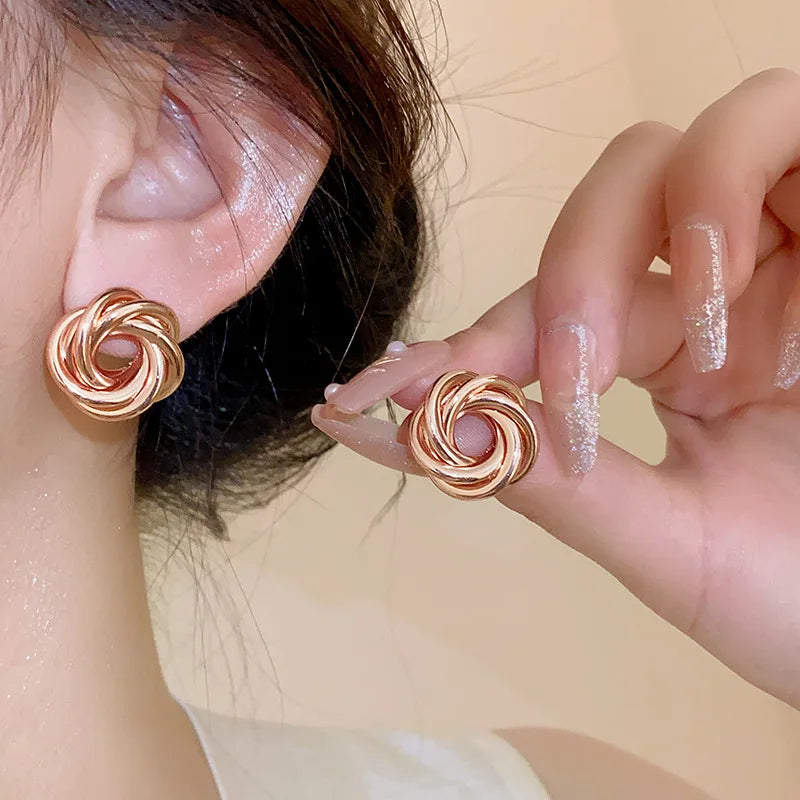 Twist Aura Hoops – Multi-Layer Geometric Earrings  Layered design. Bold shine. Modern elegance.