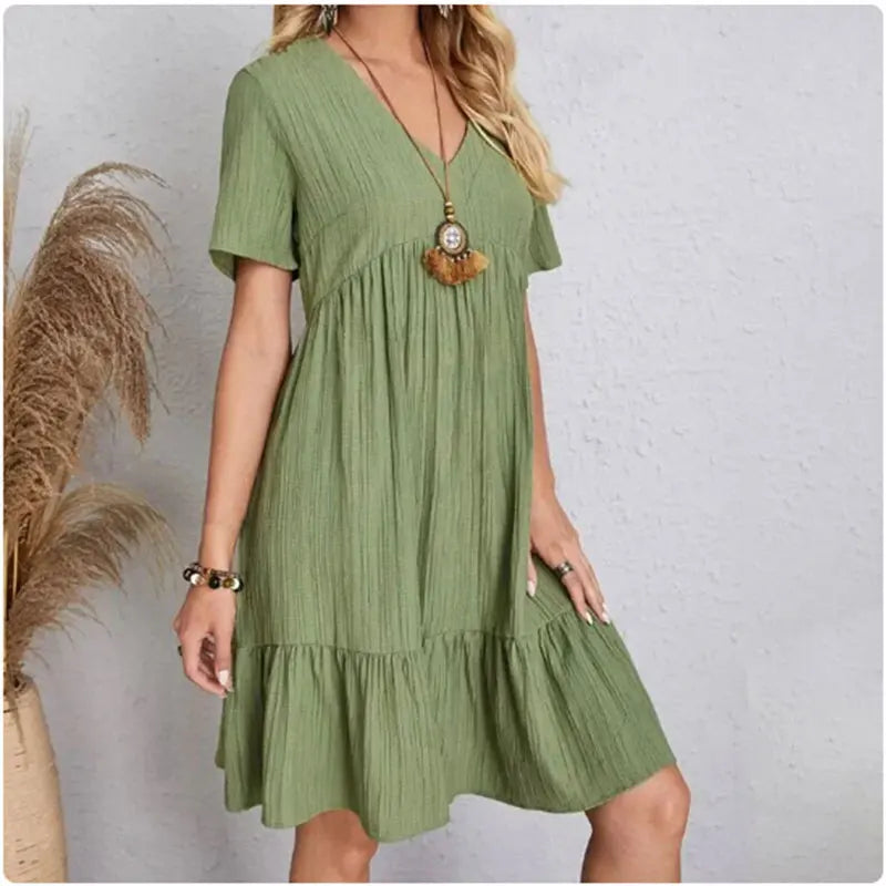 FlareMuse Peplum Dress – V-Neck Ruffle Summer Style  Soft flow. Flattering shape. Effortless charm.