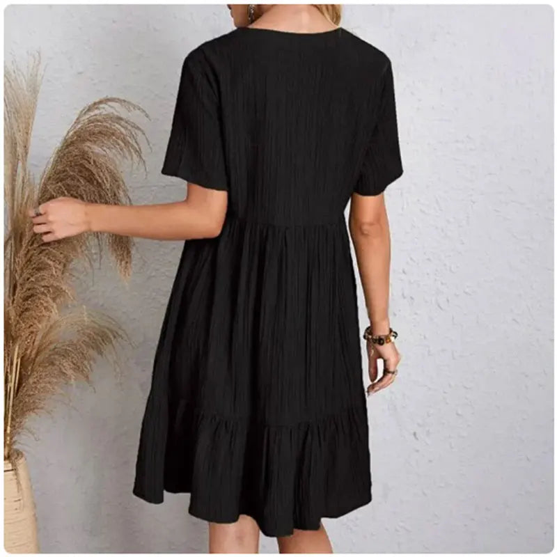 FlareMuse Peplum Dress – V-Neck Ruffle Summer Style  Soft flow. Flattering shape. Effortless charm.