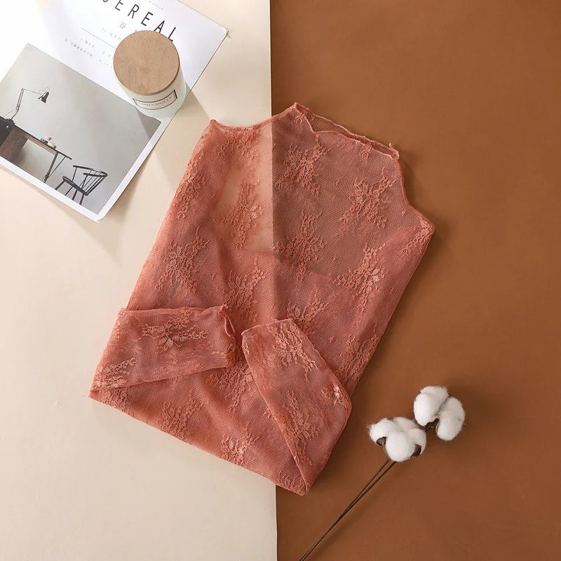 LaceMesh Crop Top – Sheer Long Sleeve Elegance  Delicate lace. Bold layers. Effortless style.