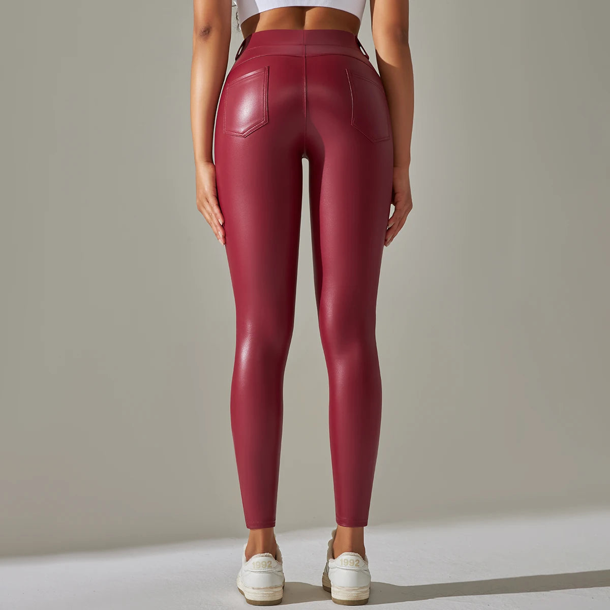 NoirSculpt Leather Leggings – High-Waist Scrunch Fit  Sleek shine. Sculpted curves. Maximum confidence.