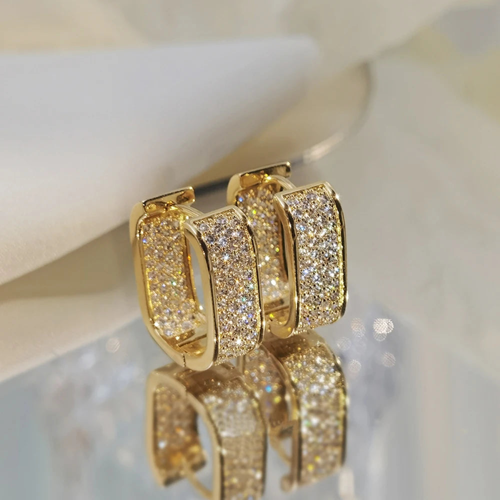 Bling Aura Hoops – CZ Luxury Statement Earrings  Maximum shine. Minimal effort. Pure elegance.
