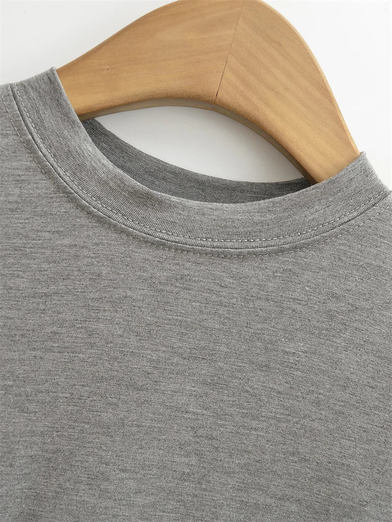 SlimMuse Tee – Y2K Solid Fit Top  Simple style. Sculpted fit. Everyday confidence.