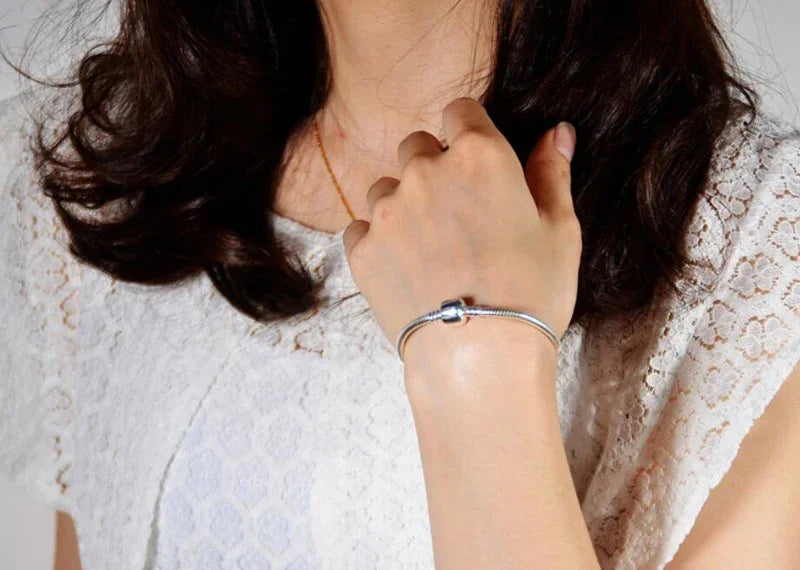 Silver Serpent Charm Bracelet – 925 Sterling Silver  Pure silver. Smooth feel. Timeless elegance.
