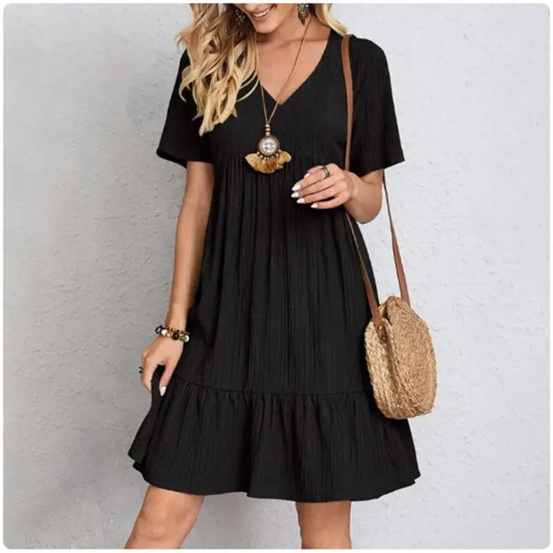 FlareMuse Peplum Dress – V-Neck Ruffle Summer Style  Soft flow. Flattering shape. Effortless charm.