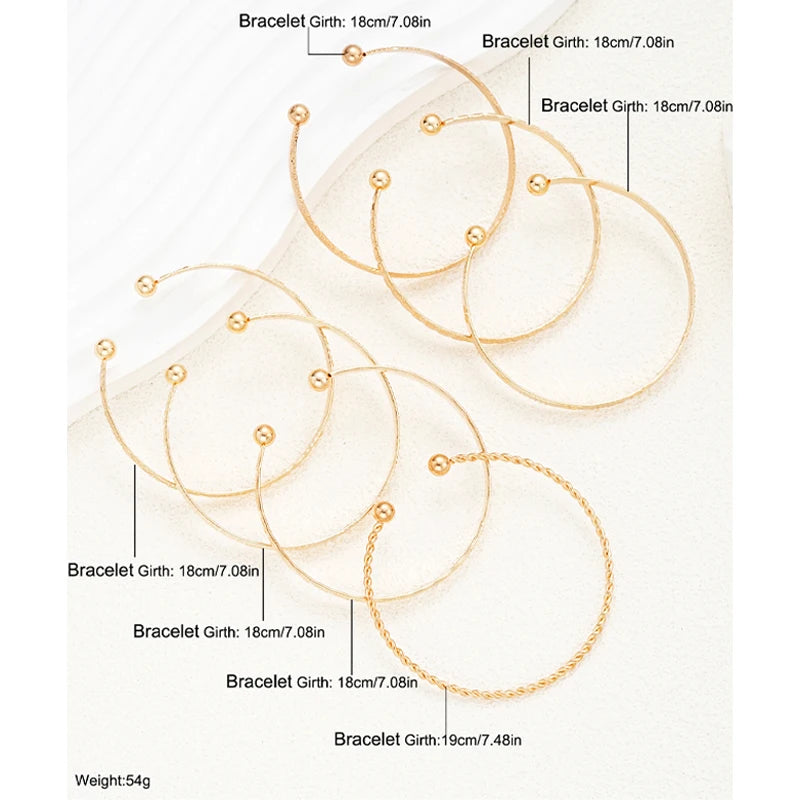Gold Edge Bracelet Set – 7PCS Punk Heart Bangles  Bold gold. Street attitude. Stack your style.