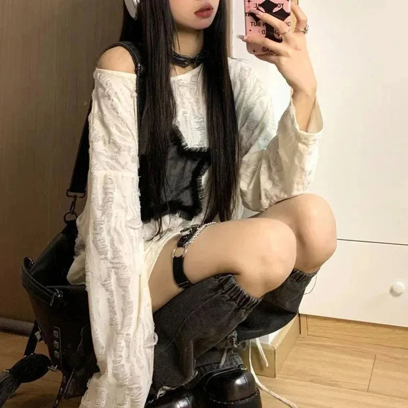 StarEdge Oversized Tee – Y2K Hole Print Streetwear  Bold details. K-pop vibes. Effortless attitude.