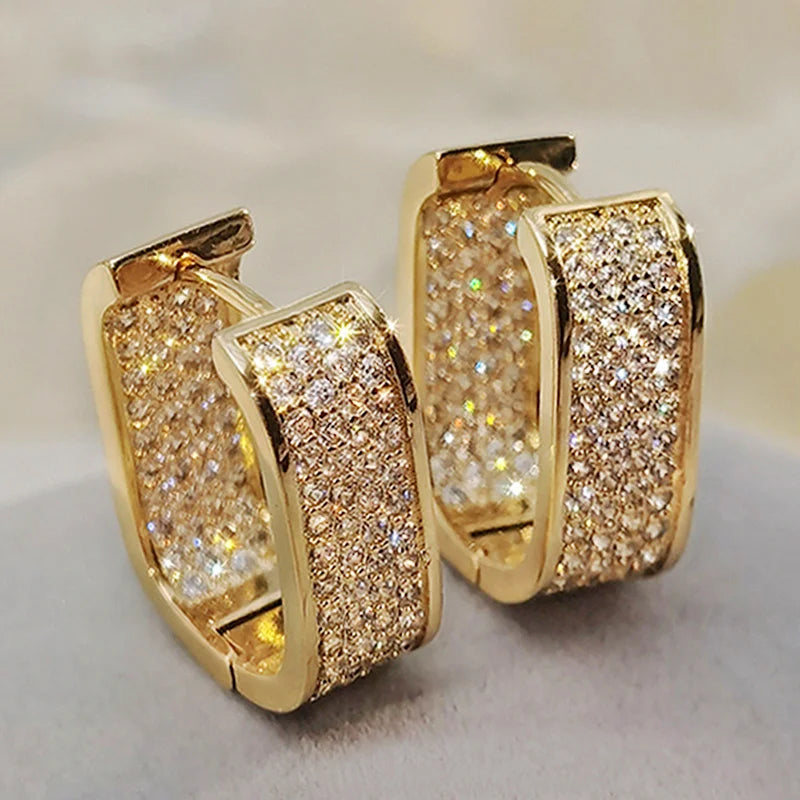 Bling Aura Hoops – CZ Luxury Statement Earrings  Maximum shine. Minimal effort. Pure elegance.